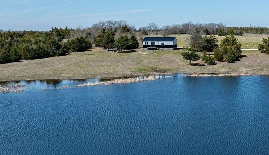 10.8 Acres of Land with Home for Sale in Roxton, Texas