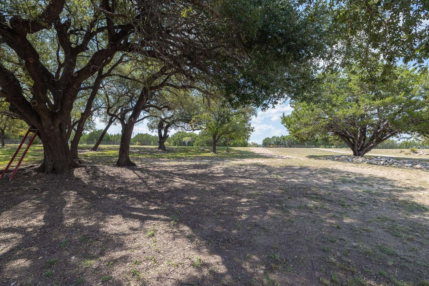16.3 Acres of Land with Home for Sale in Bertram, Texas