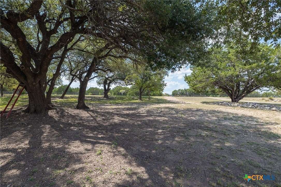 16.3 Acres of Land with Home for Sale in Bertram, Texas