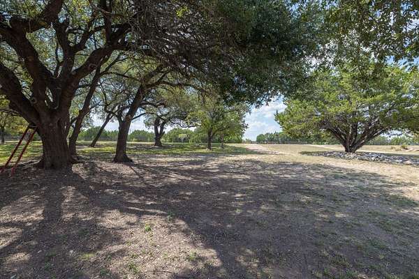 16.3 Acres of Land with Home for Sale in Bertram, Texas