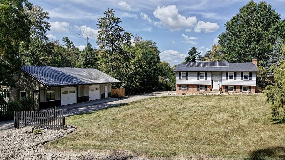 2.79 Acres of Residential Land with Home for Auction in Apple Creek, Ohio