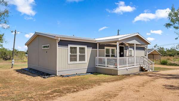 6.4 Acres of Residential Land with Home for Sale in Llano, Texas