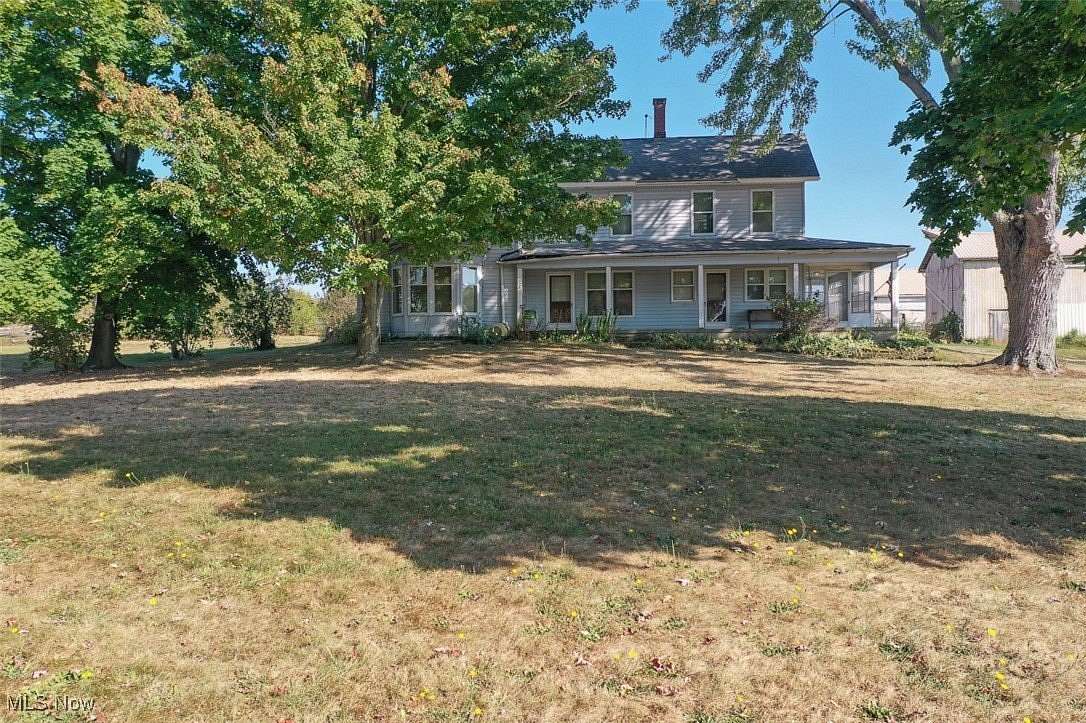 8 Acres of Residential Land with Home for Auction in Alliance, Ohio