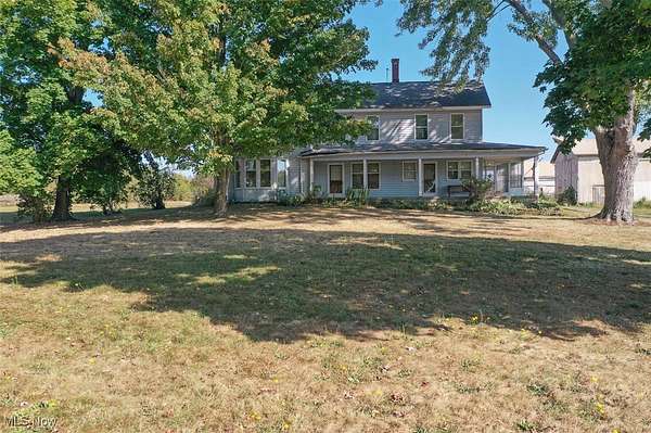 8 Acres of Residential Land with Home for Auction in Alliance, Ohio