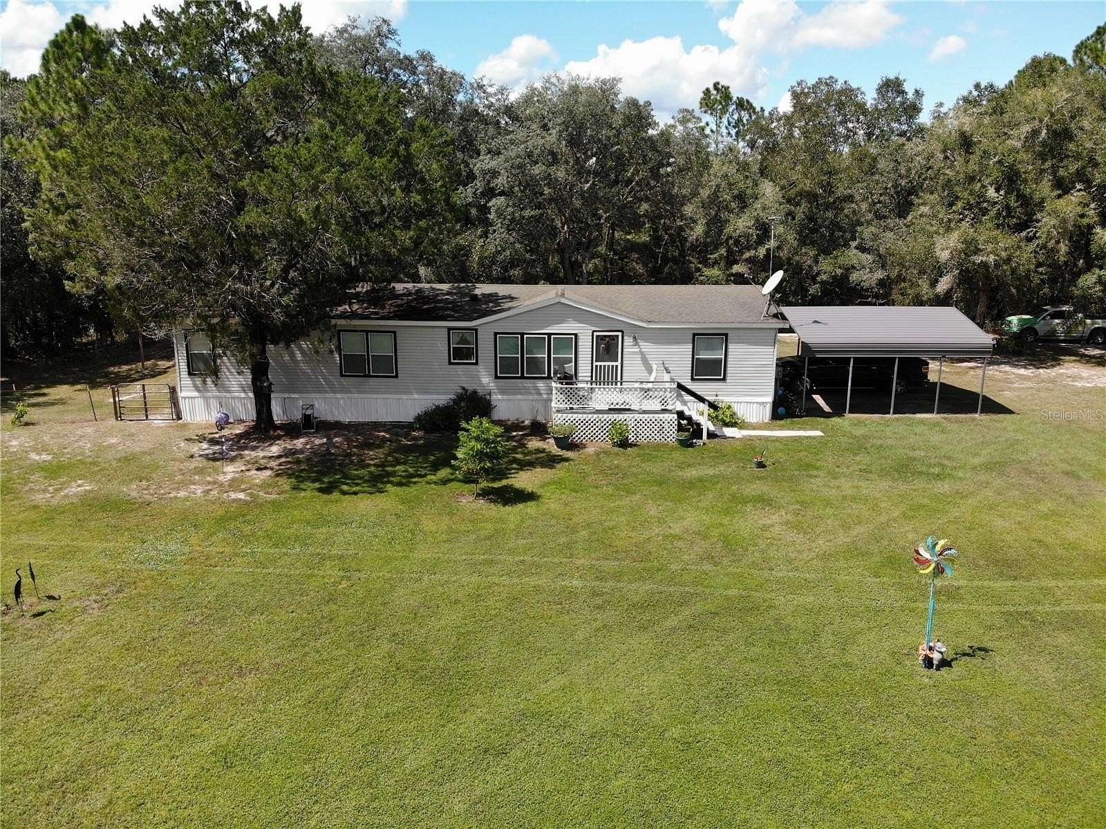 20.3 Acres of Land with Home for Sale in Morriston, Florida