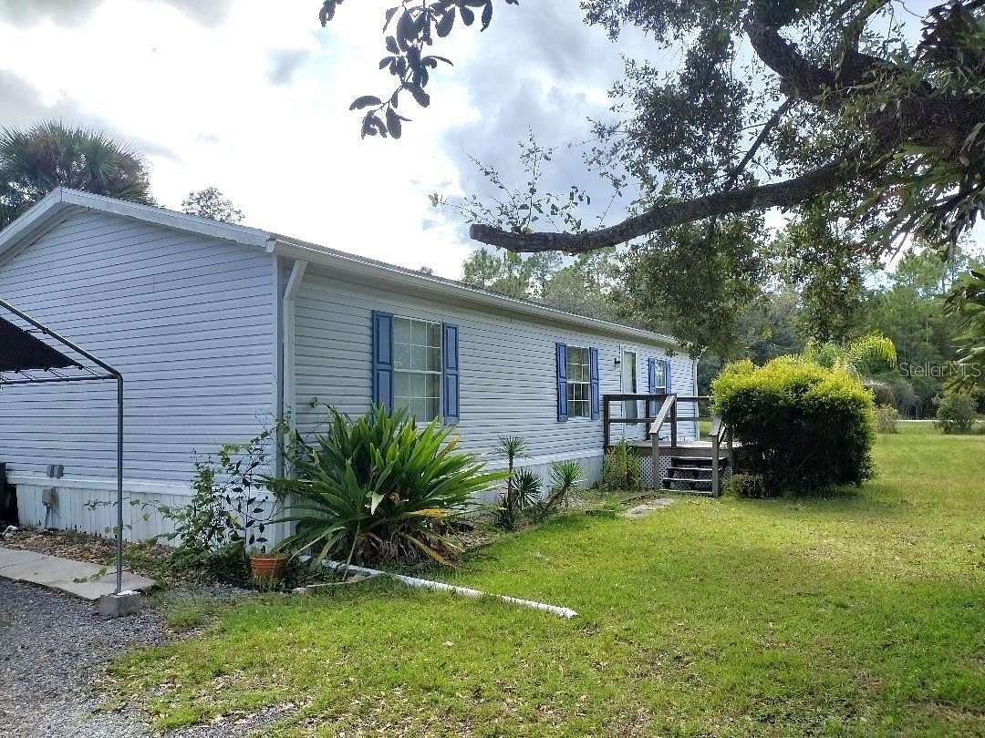 2 Acres of Land with Home for Sale in Bunnell, Florida