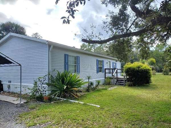 2 Acres of Land with Home for Sale in Bunnell, Florida