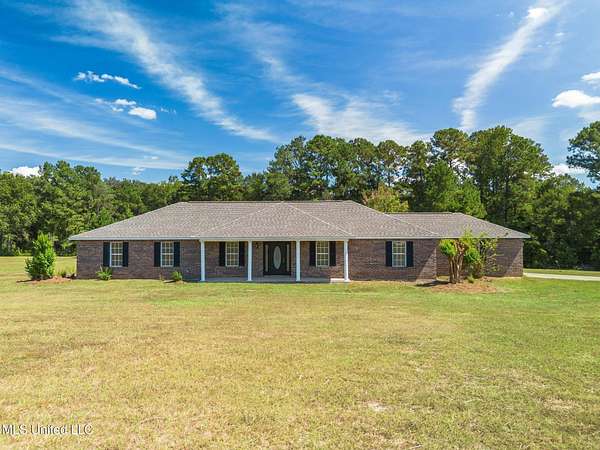 2.9 Acres of Residential Land with Home for Sale in Wiggins, Mississippi