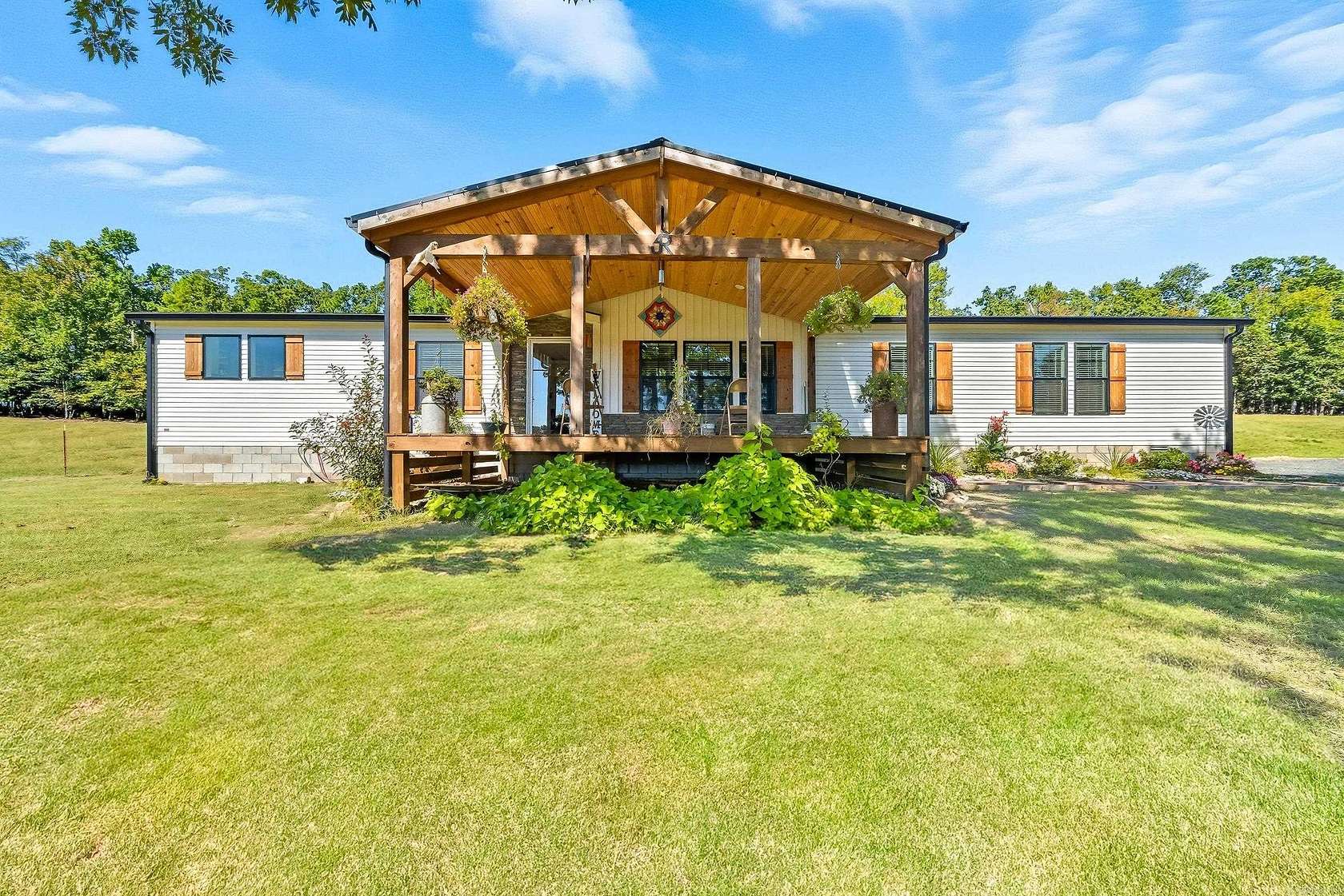 46.2 Acres of Land with Home for Sale in Umpire, Arkansas