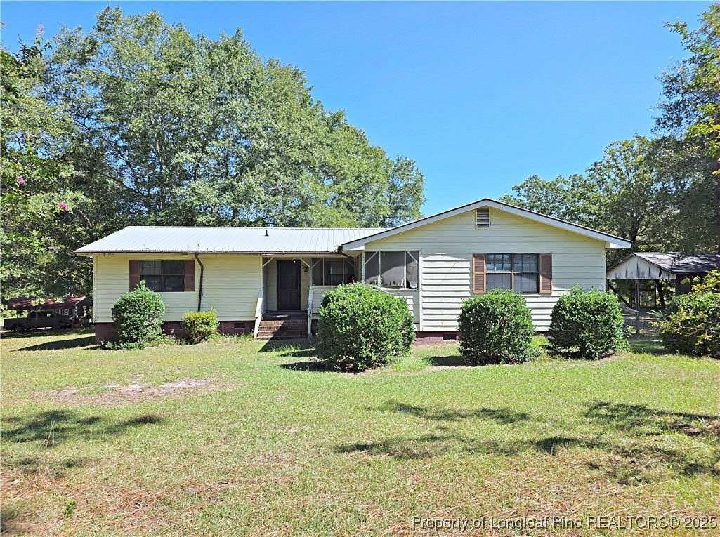 6 Acres of Residential Land with Home for Sale in Vass, North Carolina