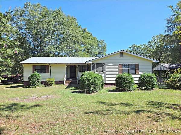 6 Acres of Residential Land with Home for Sale in Vass, North Carolina