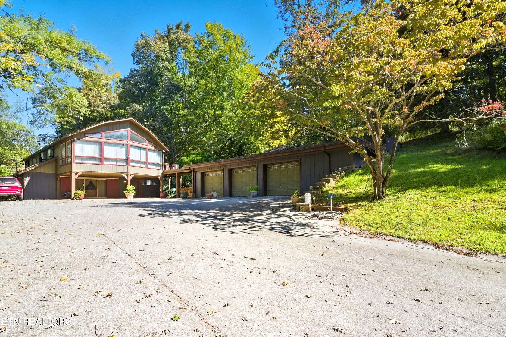 39.7 Acres of Agricultural Land with Home for Sale in Sevierville, Tennessee