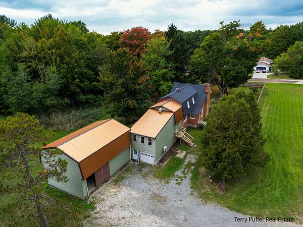 4 Acres of Residential Land with Home for Sale in Whitehall, Michigan