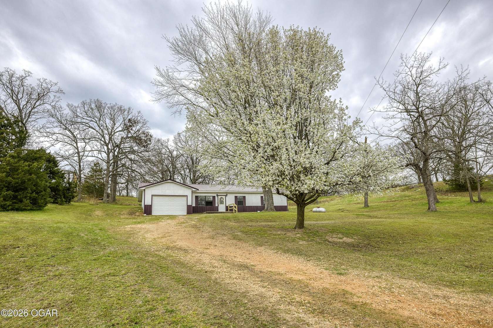 2 Acres of Land with Home for Sale in Wyandotte, Oklahoma
