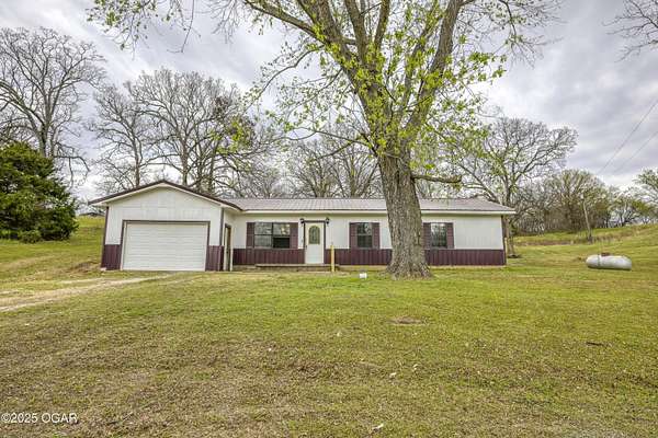 2 Acres of Residential Land with Home for Sale in Wyandotte, Oklahoma
