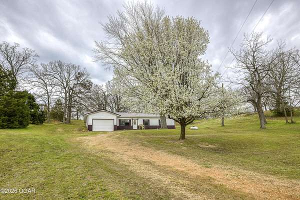 2 Acres of Land with Home for Sale in Wyandotte, Oklahoma