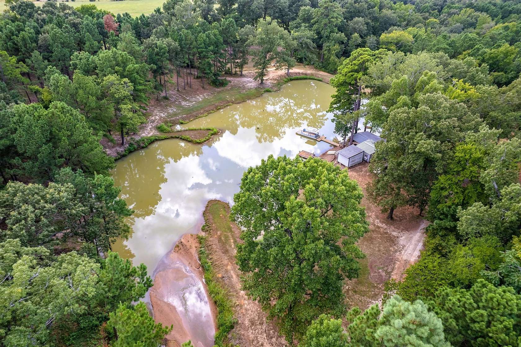 12.5 Acres of Recreational Land with Home for Sale in Jacksonville, Texas