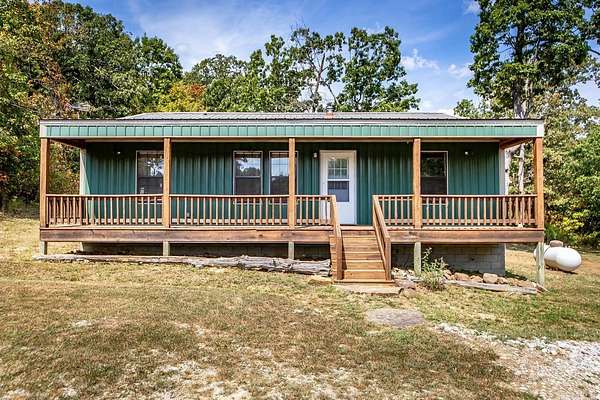 77 Acres of Recreational Land with Home for Sale in Mountain View, Arkansas