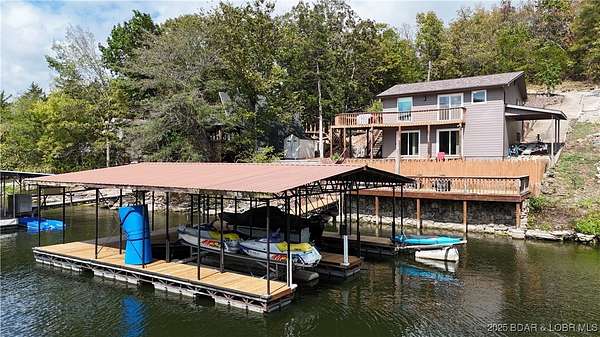 4.7 Acres of Residential Land with Home for Sale in Barnett, Missouri