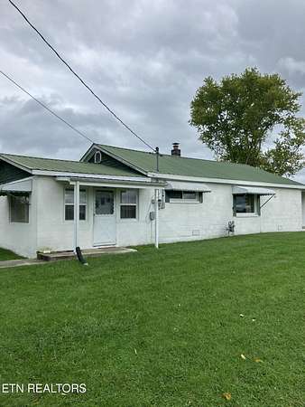 7.1 Acres of Residential Land with Home for Sale in Clarkrange, Tennessee