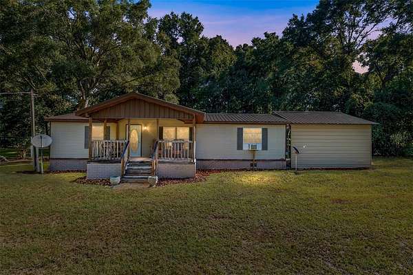 5.54 Acres of Land with Home for Sale in High Springs, Florida