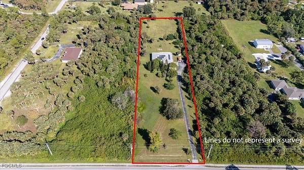 2.27 Acres of Residential Land with Home for Sale in Naples, Florida
