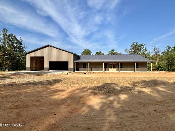 86.2 Acres of Land with Home for Sale in Finger, Tennessee