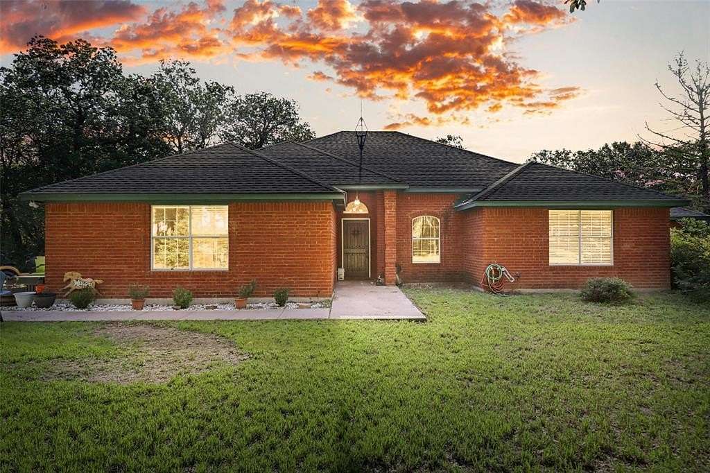 5 Acres of Residential Land with Home for Sale in Lipan, Texas