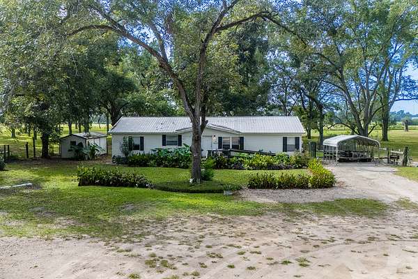 60 Acres of Agricultural Land with Home for Sale in Chiefland, Florida