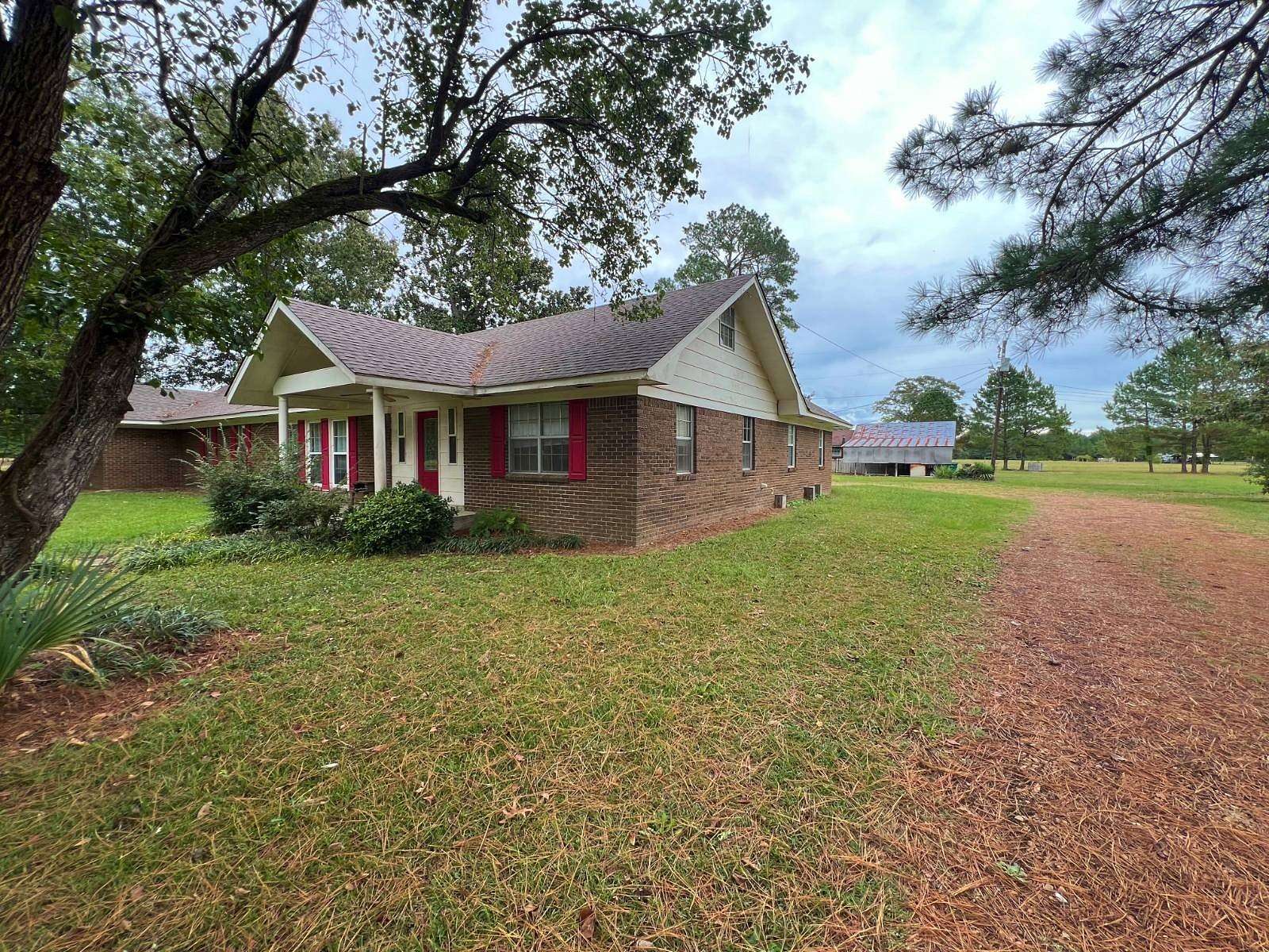 1.5 Acres of Land with Home for Sale in Grenada, Mississippi