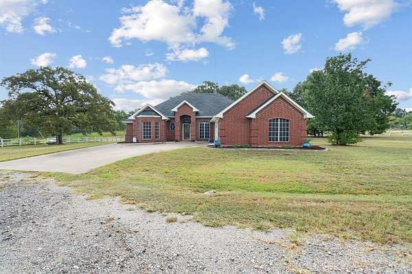 10 Acres of Land with Home for Sale in Scurry, Texas