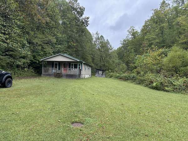 16 Acres of Land with Home for Sale in Salyersville, Kentucky