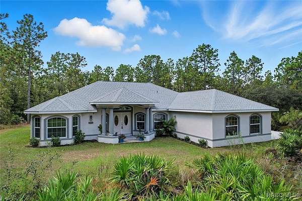 4 Acres of Residential Land with Home for Sale in Beverly Hills, Florida