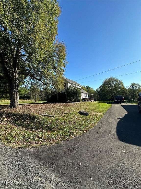 16.5 Acres of Land with Home for Auction in Deerfield, Ohio