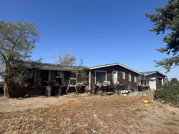 9.5 Acres of Residential Land with Home for Sale in Nine Mile Falls, Washington