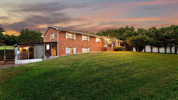 3.1 Acres of Residential Land with Home for Sale in Knoxville, Tennessee