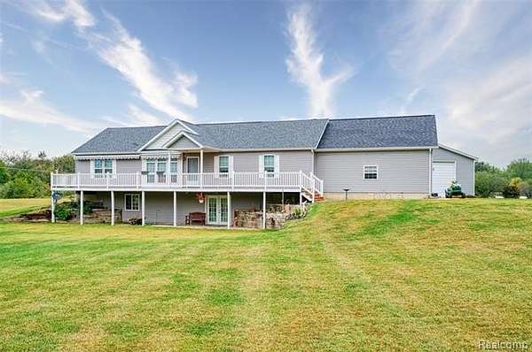 20.9 Acres of Recreational Land with Home for Sale in Byron, Michigan