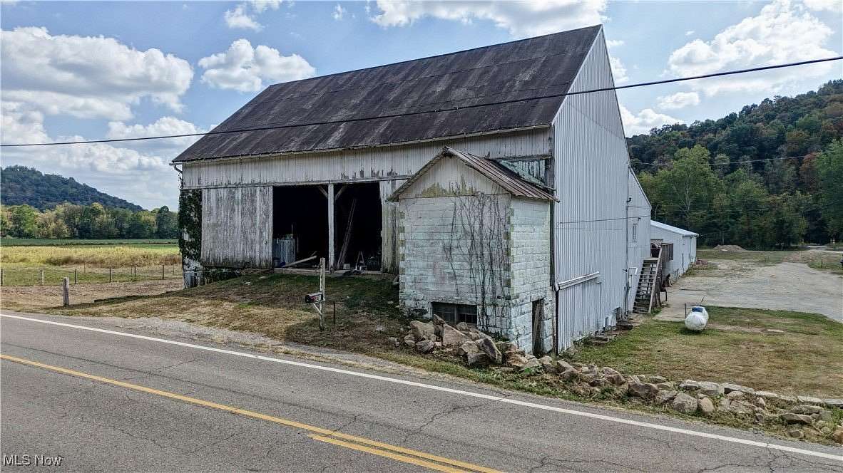 13.8 Acres of Land with Home for Auction in Glenmont, Ohio