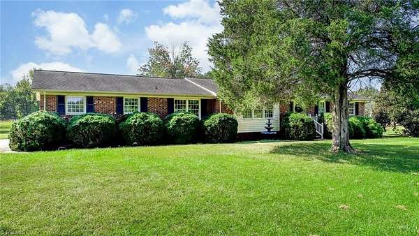 18 Acres of Land with Home for Sale in Gibsonville, North Carolina