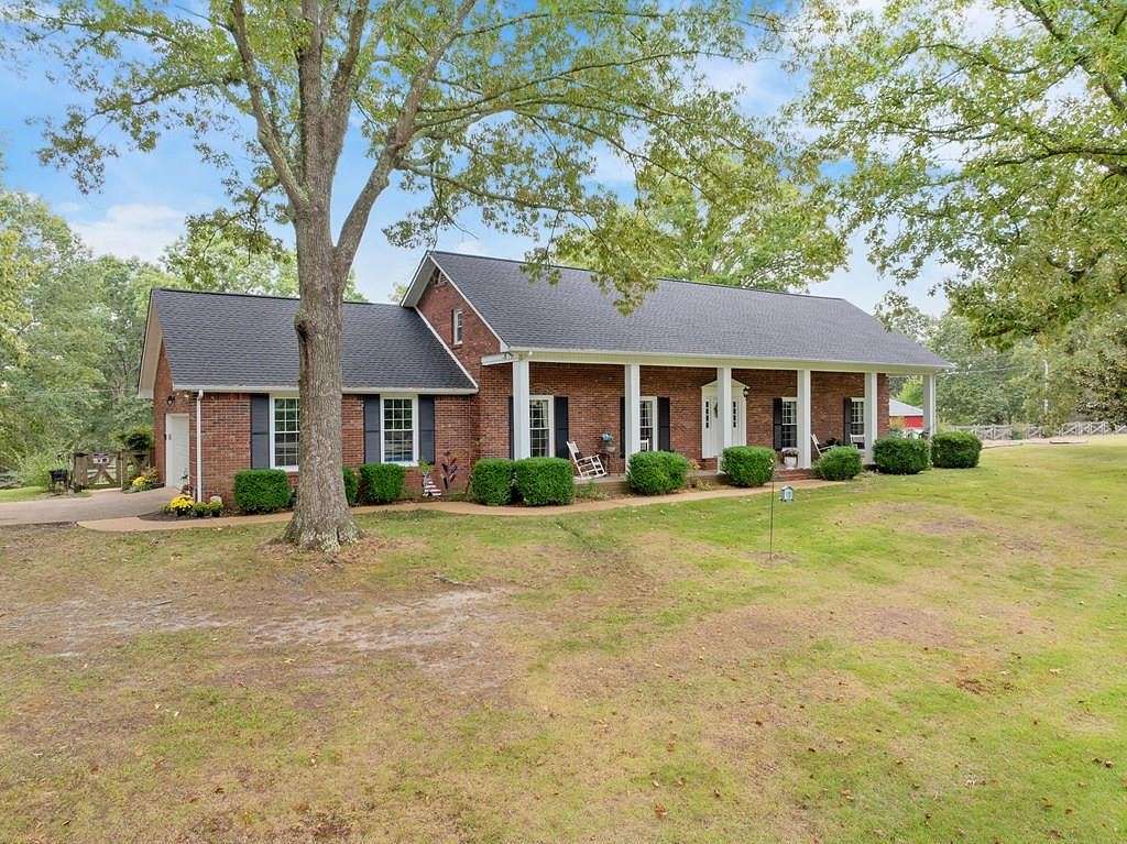 92.2 Acres of Land with Home for Sale in Camden, Tennessee