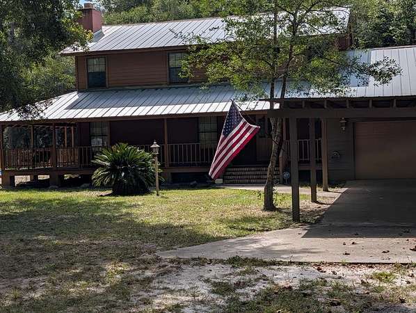 5 Acres of Residential Land with Home for Sale in Chiefland, Florida