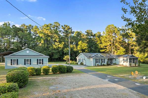 5 Acres of Residential Land with Home for Sale in Crawfordville, Florida