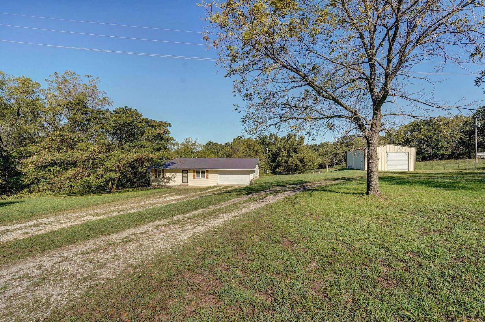 9.2 Acres of Land with Home for Sale in Miller, Missouri