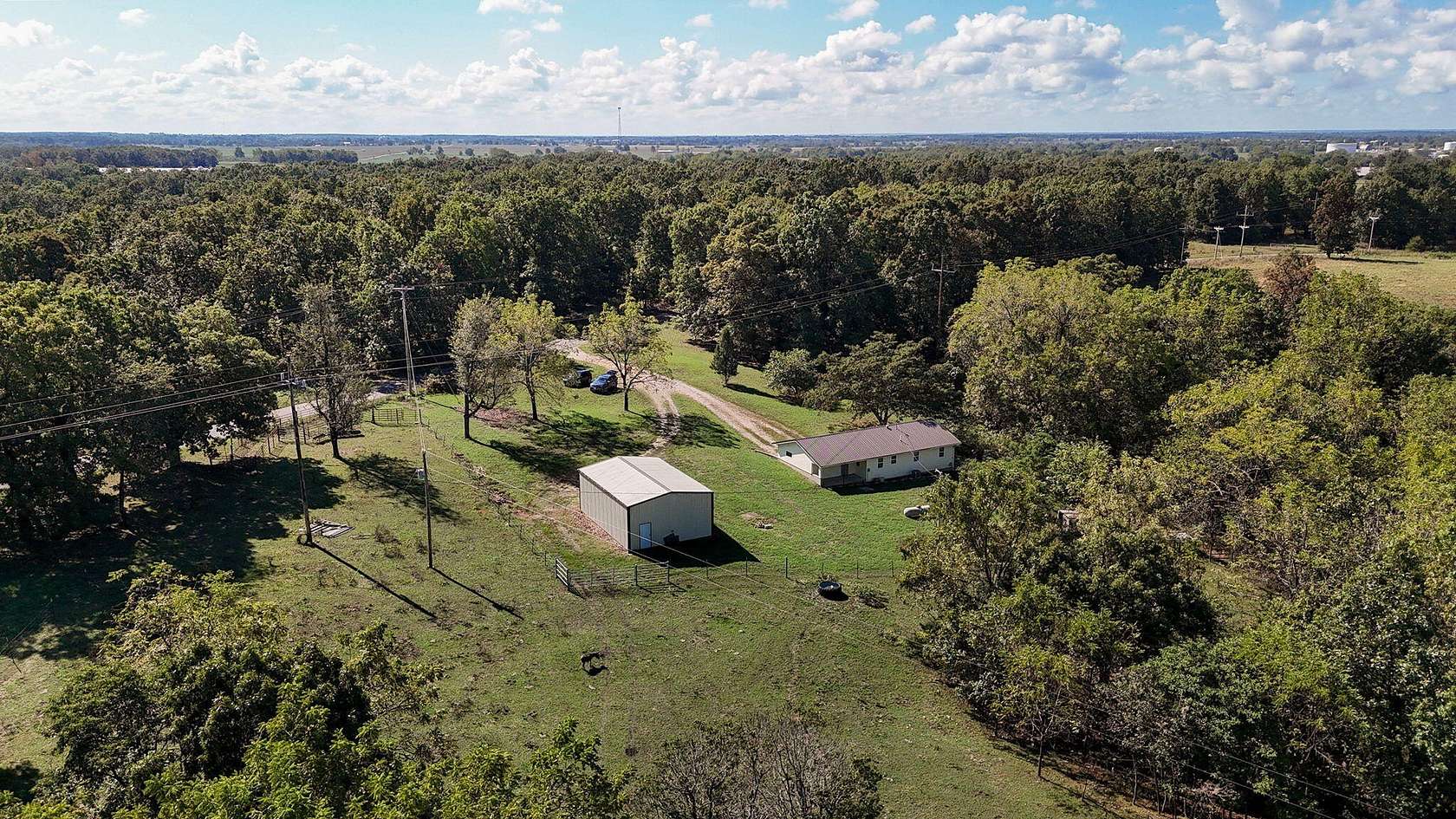 9.2 Acres of Land with Home for Sale in Miller, Missouri