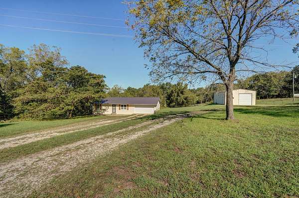 9.2 Acres of Land with Home for Sale in Miller, Missouri
