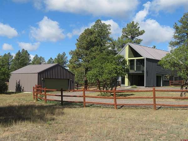 5.17 Acres of Residential Land with Home for Sale in Pagosa Springs, Colorado