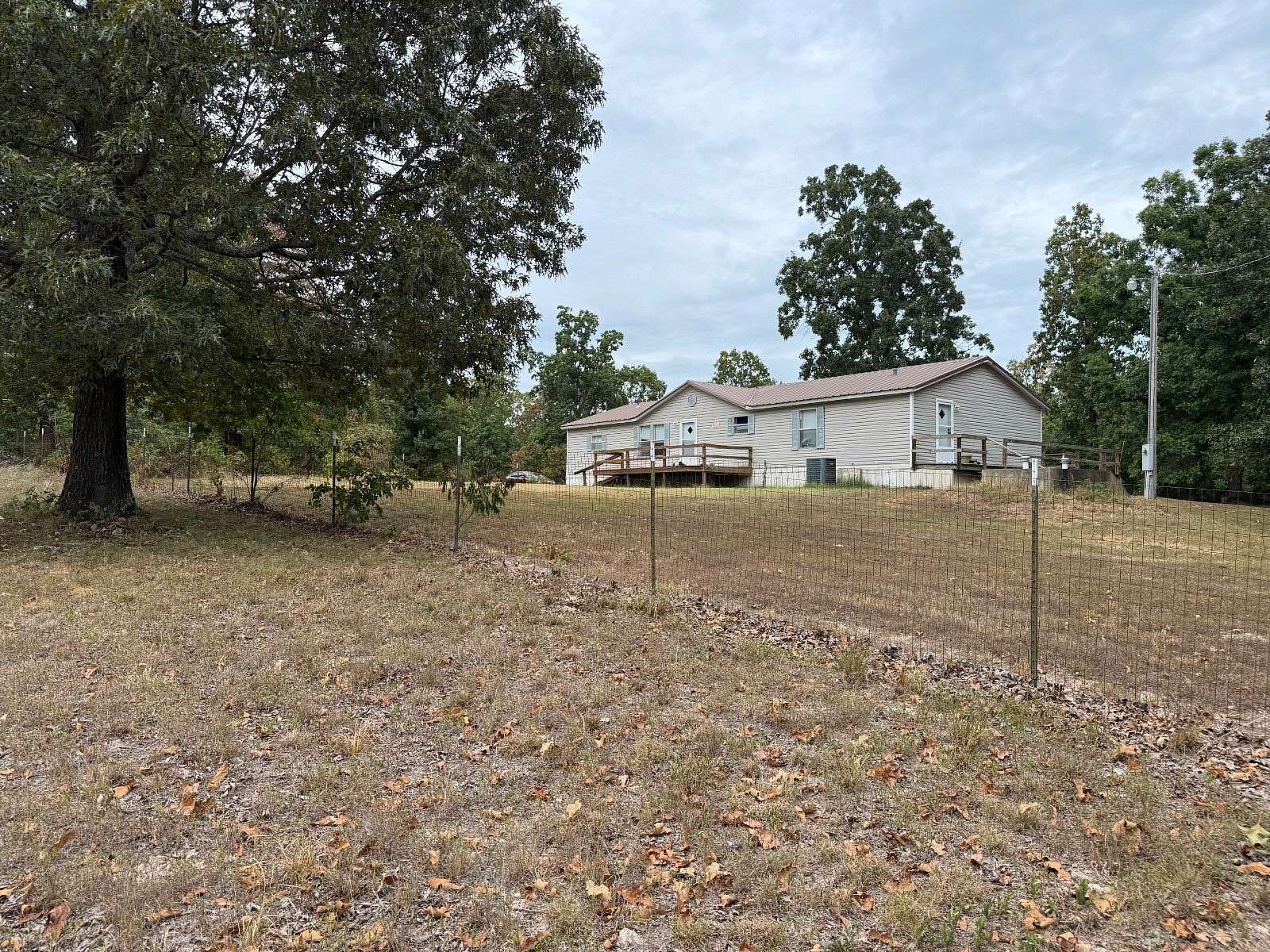 5 Acres of Land with Home for Sale in Evening Shade, Arkansas