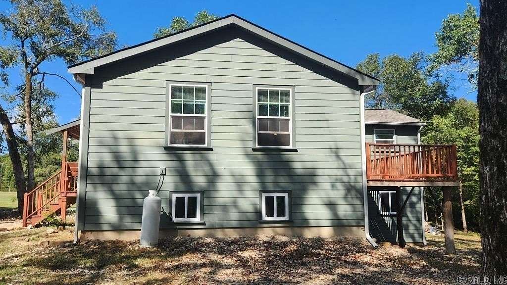 4.26 Acres of Land with Home for Sale in Story, Arkansas