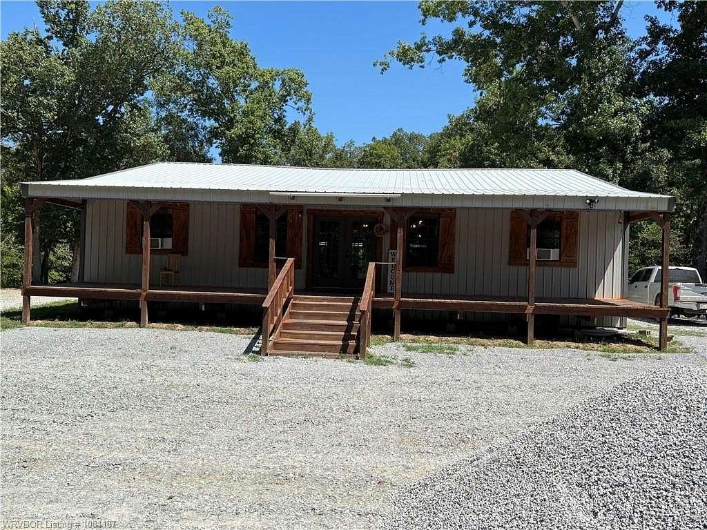 74.2 Acres of Recreational Land with Home for Sale in Honobia, Oklahoma