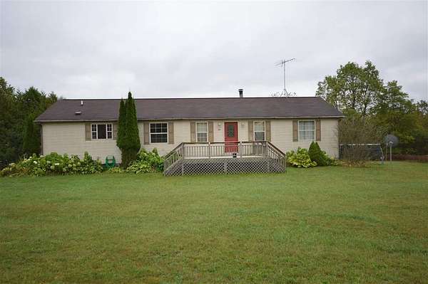 2 Acres of Residential Land with Home for Sale in East Jordan, Michigan